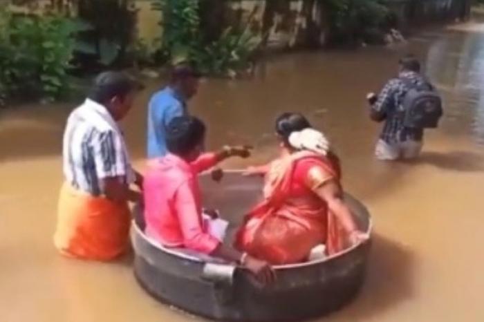 Viajan en una gran olla para llegar a su boda luego de inundación