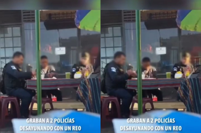 Captan a dos policías comiendo con un hombre